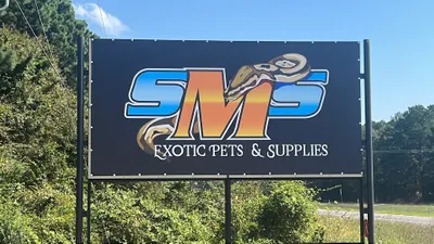 Custom Vinyl Banners - We are a new pet store in town