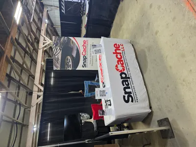 Custom Rectangle Table Covers - SnapCache LLC Vender setup at the local fair