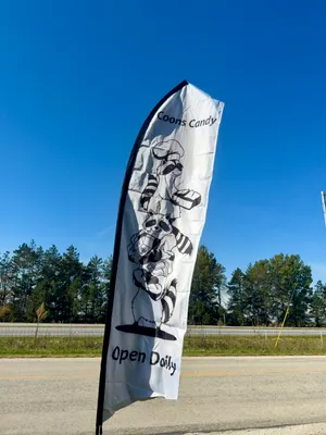 Swooper Flag - Coon Candy We are a 109 yr fifth generation owned candy business We are known worldwide specializing in our famous Old English Toffee We also carry many different candies We can be found at 16451 Co Rd 113 Harpster OH 43323 Open daily M - S 10-5 and Sundays 12-5 We can be reached at 740-496-4141 or online at wwwcoonscandycom